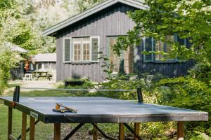 Taula de ping-pong a Summer House With Large Nature Plot In Rørvig o a prop