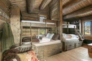 Ένα ή περισσότερα κρεβάτια σε δωμάτιο στο Cabin With Panoramic View Over Hardangervidda