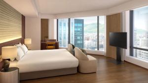Ένα ή περισσότερα κρεβάτια σε δωμάτιο στο The Gate Hotel Sapporo by Hulic