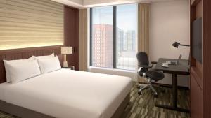 Ένα ή περισσότερα κρεβάτια σε δωμάτιο στο The Gate Hotel Sapporo by Hulic