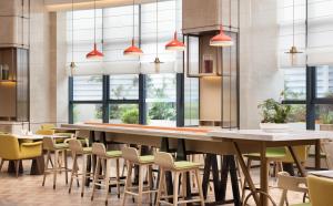 Restaurace v ubytování Hilton Garden Inn Xingyi Orange Hill Plaza
