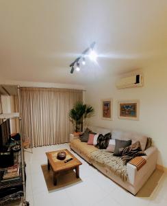 Posezení v ubytování Condomínio Essence Life Residence Pé na Areia