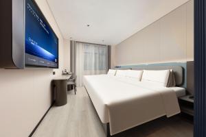 Televisor o centre d'entreteniment de Atour Light Hotel Shanghai Bund People's Square-FreeMini Bar and Free Night Snacks