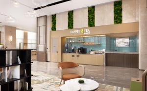 Kuchyň nebo kuchyňský kout v ubytování Hilton Garden Inn Xingyi Orange Hill Plaza
