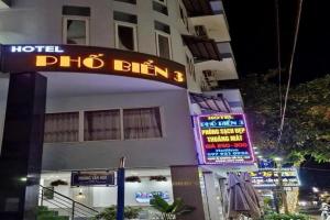 a sign for a hotel phibbi on a building at Phố Biển 3 in Vung Tau +12 photos
