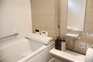 Een badkamer bij New open 岸里玉出 Maison Le Jaune 玉子心斋桥道顿崛电车直达