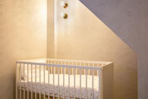 Llit o llits en una habitació de trive ozone2 trive kids バンテリンドーム ナゴヤ近く 大曽根駅 徒歩3分