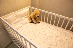 Llit o llits en una habitació de trive ozone2 trive kids バンテリンドーム ナゴヤ近く 大曽根駅 徒歩3分