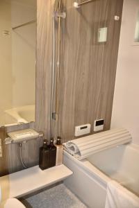 Kupatilo u objektu new open岸里玉出 Maison Le Blanc 白練 心斋桥道顿崛通天阁电车直达