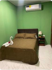 Ένα ή περισσότερα κρεβάτια σε δωμάτιο στο Apartamento Esmeralda