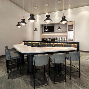 a dining room with a large table and chairs at Homewood Suites By Hilton Saltillo in Saltillo