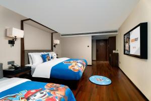Postel nebo postele na pokoji v ubytování SSAW Hotel (Jiefangbei Hongyadong Branch)