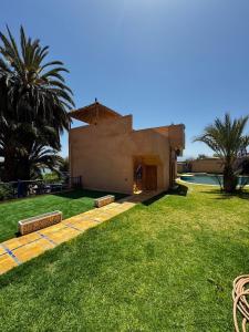 Zahrada ubytování DAR N'FIS Région Marrakech HEBERGEMENT AU BORD Du LAC ÉVASION PISCINE ACTIVITÉS WIFI
