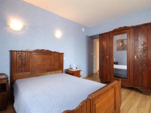 Postel nebo postele na pokoji v ubytování Charmant Gîte Rural avec Jardin en Haute-Saône - FR-1-583-438