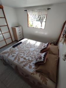 Postel nebo postele na pokoji v ubytování HAUHITI Lodge