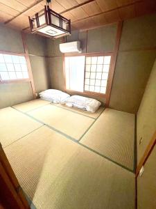 Letto o letti in una camera di Ocean View House Hannan 3rd