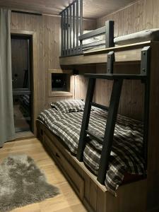 En eller flere senge i et værelse på Cabin With Panoramic Views In Turufjell + 14 billeder