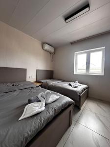 Ένα ή περισσότερα κρεβάτια σε δωμάτιο στο Fa Ko Fiemea Hotel +24 φωτογραφίες