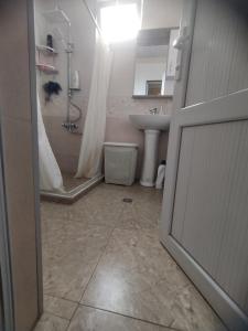 Koupelna v ubytování Jibghashvilebi's house + 17 fotografií