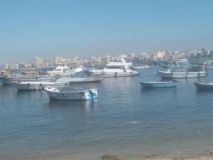 a group of boats sitting in the water at Affordable downtown studio steps to sea free wifi in Alexandria