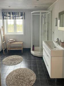 Ένα μπάνιο στο Designer Cabin With Panoramic Views In Hovden