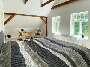 Photo de la galerie de l'établissement Historisk Aftægtsbolig Fra 1908 Ved Søer Og Skov, à Branderup 6 autres photos