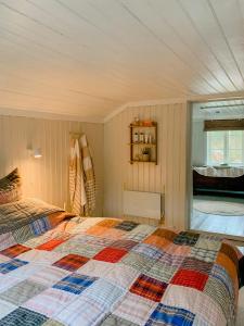 a bedroom with a bed in a room at Idyllic House In A Lovely Hiking Area in Strömstad