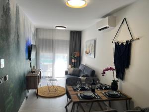 TV a/nebo společenská místnost v ubytování Apartament Slatine No 1