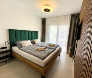 Postel nebo postele na pokoji v ubytování Apartament Slatine No 1 + 18 fotografií