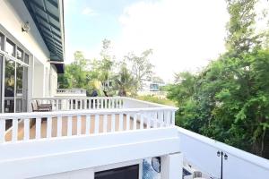 Balkón nebo terasa v ubytování BM Pool Villa Pattaya