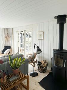 Zona de estar de Split-Level Holiday Home With View Of Årø