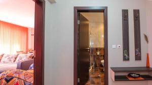 a living room with a door leading to a living room at Flat Lora Pomorie in Pomorie