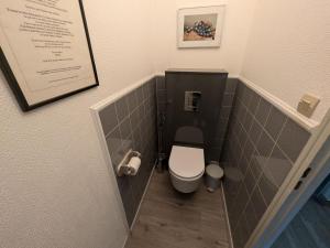 a small bathroom with a toilet in a hallway at Gîte calme proche Villersexel, nature et activités - FR-1-583-450 in Esprels +27 photos