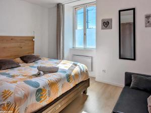 Voodi või voodid majutusasutuse Appartement rénové avec jardin à Héricourt - FR-1-583-442 toas