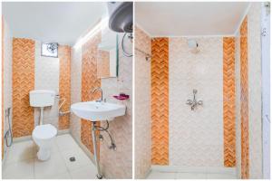a bathroom with a toilet and a sink and a shower at Collection O Lenin Sarani in Kolkata