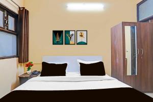 Katil atau katil-katil dalam bilik di Collection O Shalimar Bagh Max Hospital +21 gambar