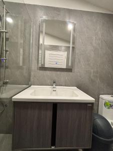 Koupelna v ubytování K2 Seaside Suites