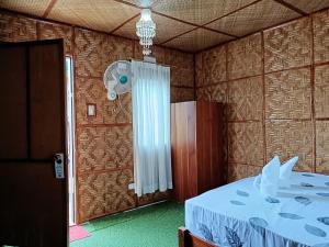 Postel nebo postele na pokoji v ubytování PalomaVilla Resort