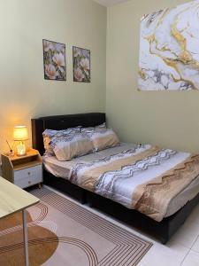 Ένα ή περισσότερα κρεβάτια σε δωμάτιο στο Wanda Homestay