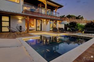Πισίνα στο ή κοντά στο VILLA AUSTRAL et LAGONS