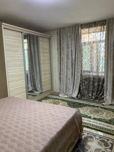 Ένα ή περισσότερα κρεβάτια σε δωμάτιο στο Art hous Hotel
