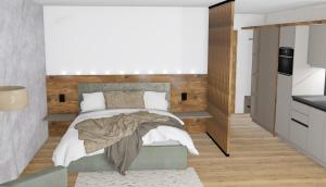 Un pat sau paturi într-o cameră la Kristall Apartments