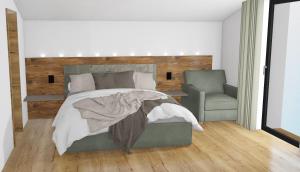 Un pat sau paturi într-o cameră la Kristall Apartments