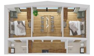 Un pat sau paturi într-o cameră la Kristall Apartments