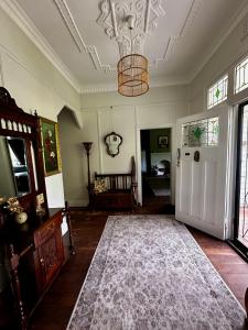 En eller flere senge i et værelse på Hilltop Cottage