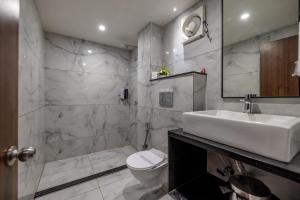Koupelna v ubytování Hotel Classique, Rajkot