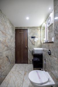 Koupelna v ubytování Hotel Classique, Rajkot