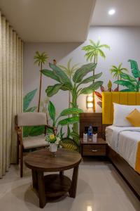 Postel nebo postele na pokoji v ubytování Hotel Classique, Rajkot