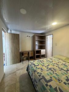 Postel nebo postele na pokoji v ubytování Casona La Española