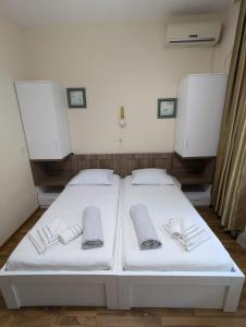 Letto o letti in una camera di Hotel Captain